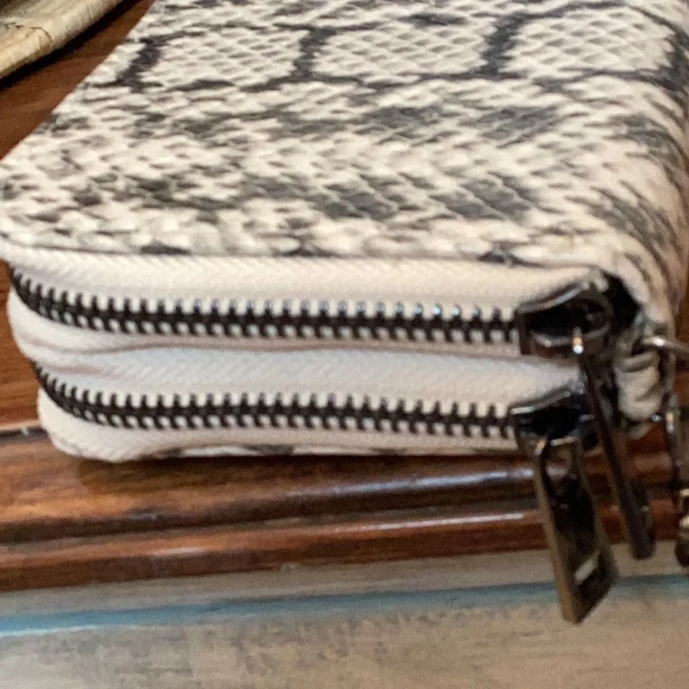 A New Day snakeskin double zip wallet with removable wristlet strap